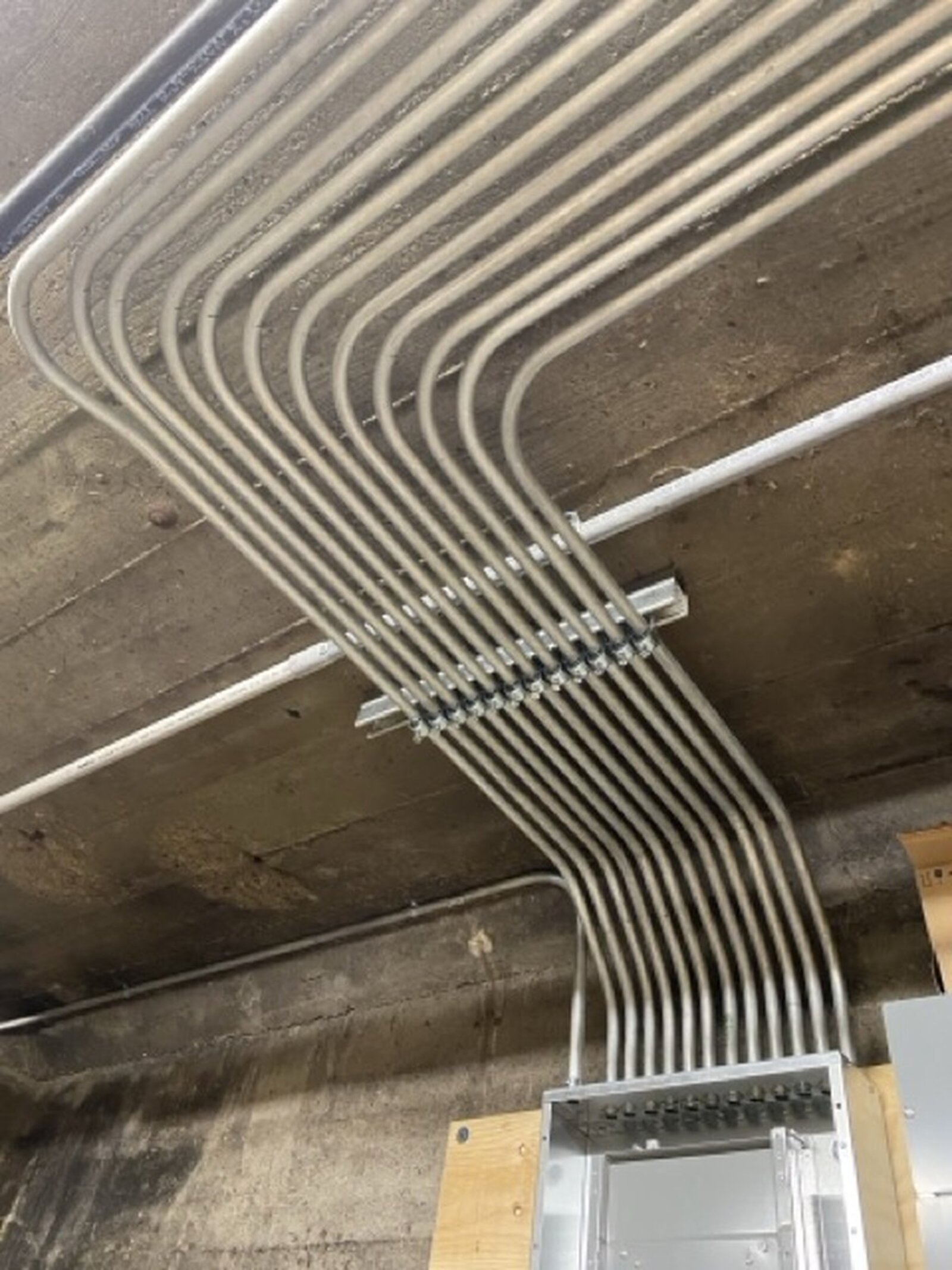 Metallic conduits neatly aligned